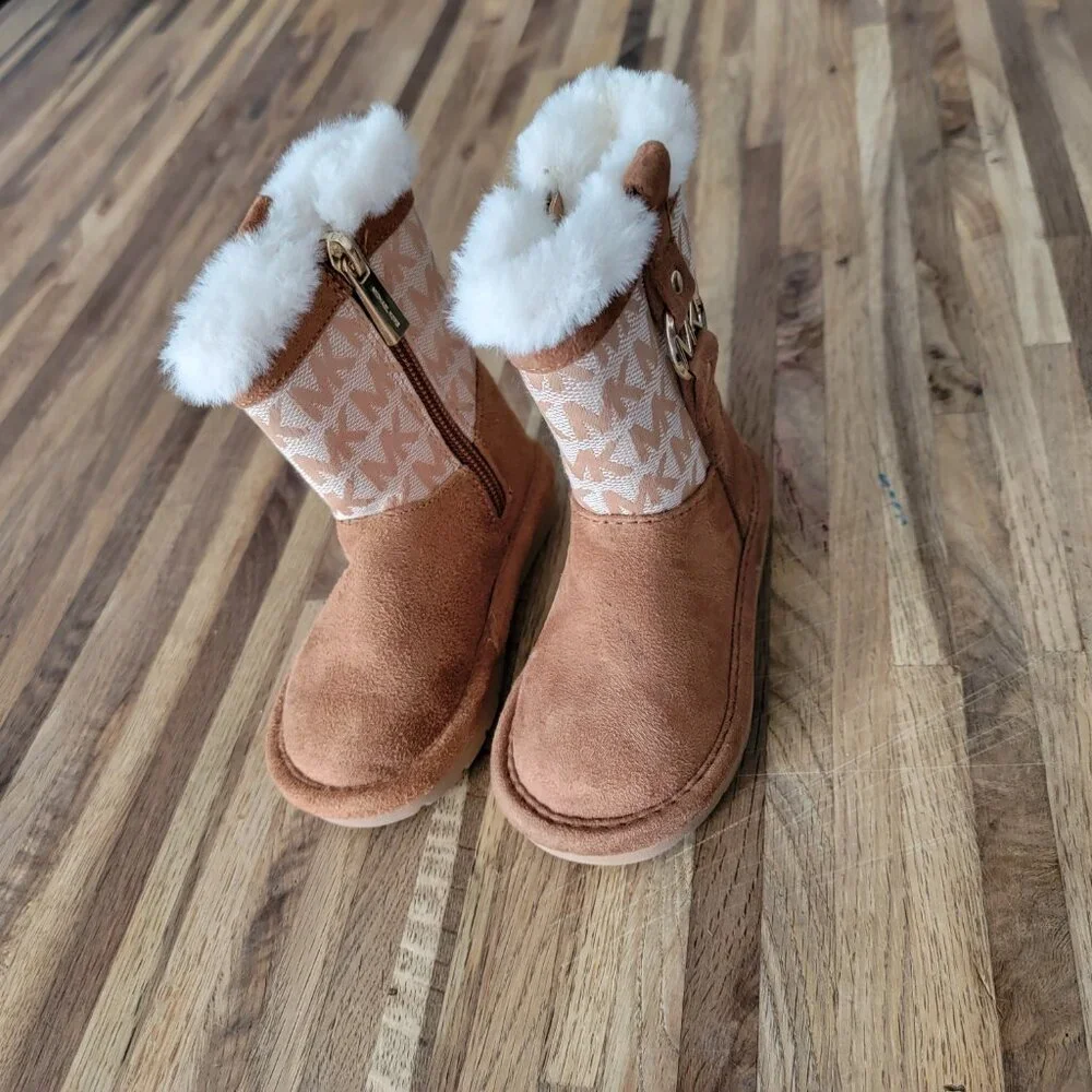 Michael Kors Yancy Girl Toddler boots featuring a brown logo print and faux fur
